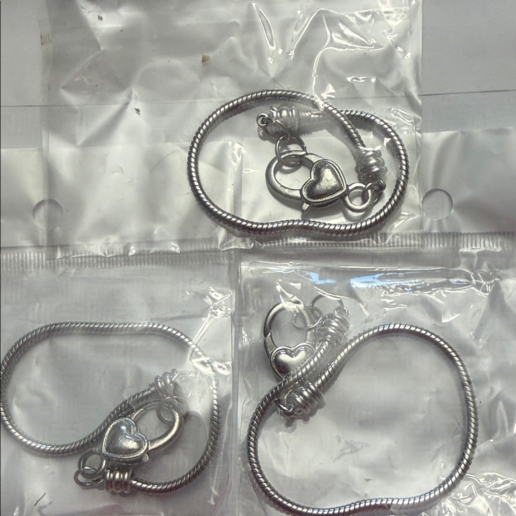 * New* Pugster Silver Heart Charm Bracelets
